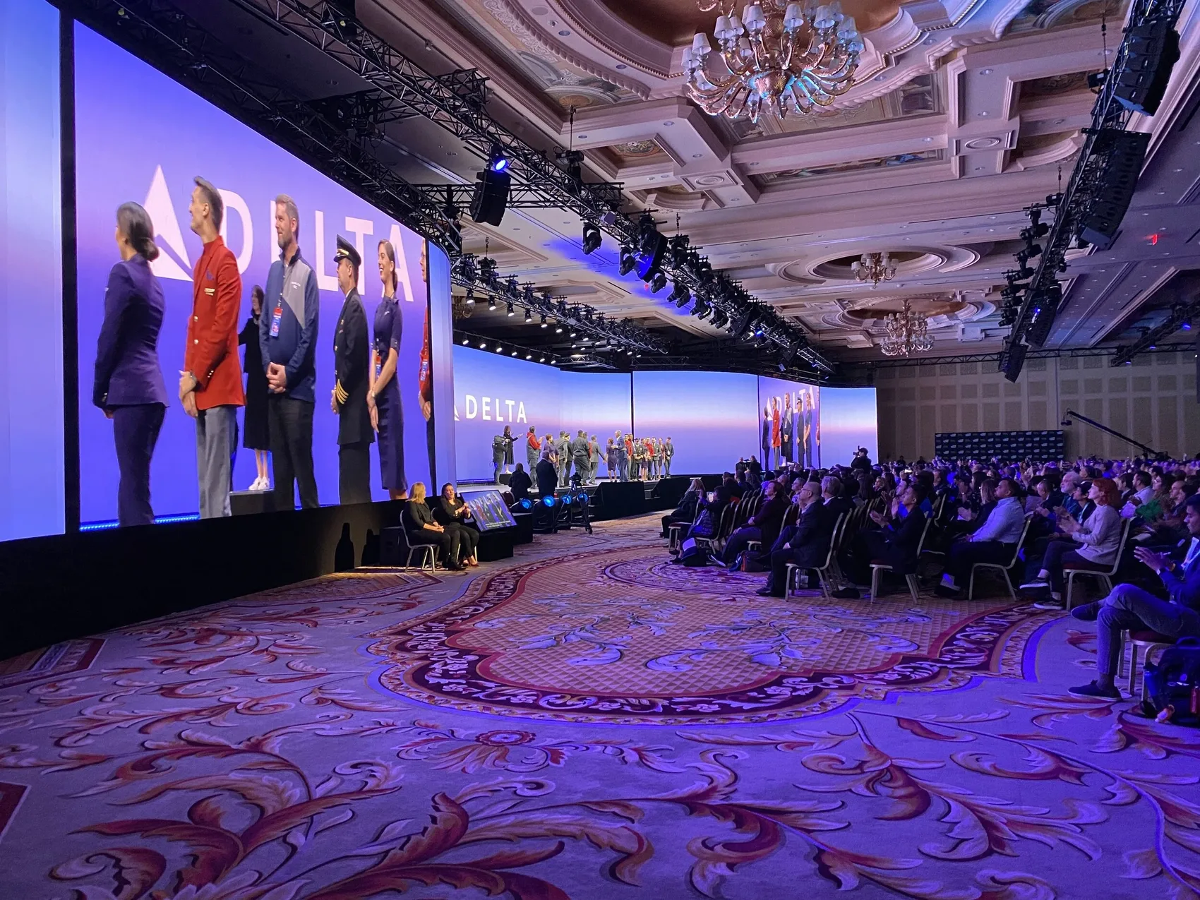Delta employees on stage at the close of the CES 2020 keynote, in front of a full room